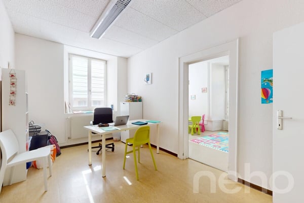 Bel immeuble mixte au coeur de St-Imier avec bon rendement! 11