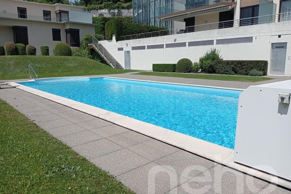 Rez-de-jardin d?exception avec piscine chauffée et vue lac?Alpes 1