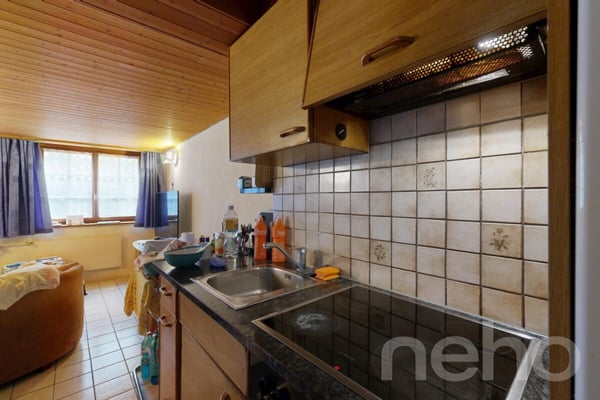 Mehrfamilienhaus mit 4 Wohnungen, Studio und Garage in zentraler Lage 12