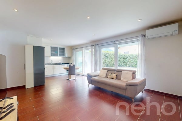 Exclusif : Bel appartement avec terrasse couverte et jardin 1