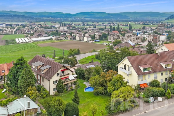 Attraktives Mehrfamilienhaus auf grossem Grundstück mit Weitsicht 1