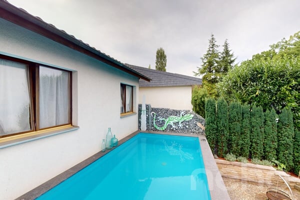 Einzigartige Gartenwohnung mit Aussenpool 4