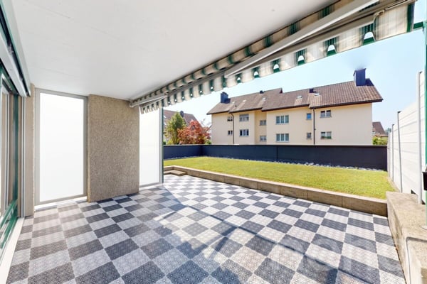 Moderne und renovierte Maisonette-Wohnung mit Gartensitzplatz 12