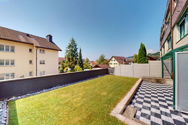 Moderne und renovierte Maisonette-Wohnung mit Gartensitzplatz 11