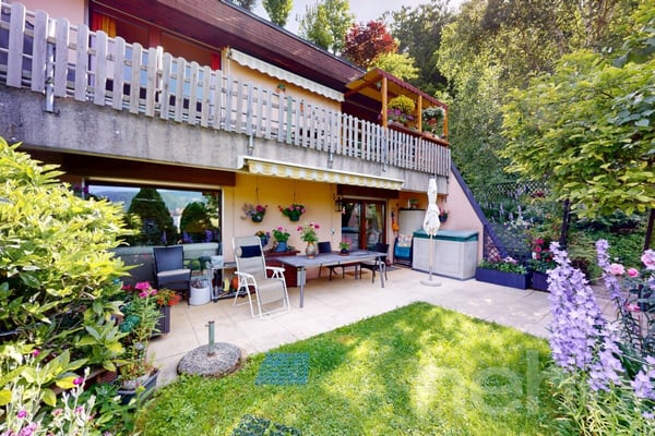 Superbe 4,5 pièces avec jardin, vue montagne et garage 1