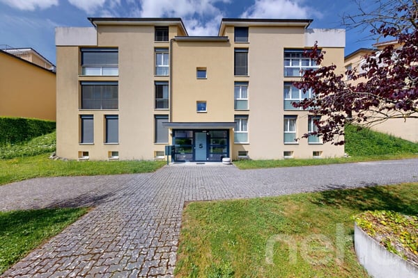 Duplex contemporain de 5,5 pièces avec jardin à Cortaillod 1