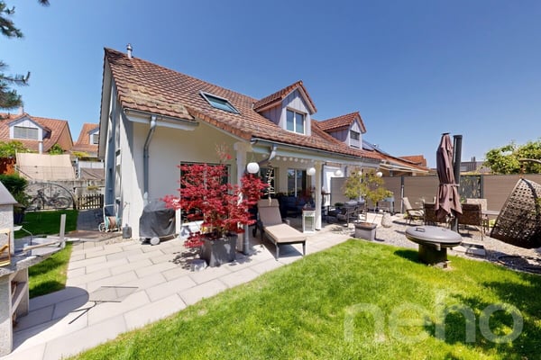 Familienfreundliches Einfamilienhaus mit sonnigem Garten 1