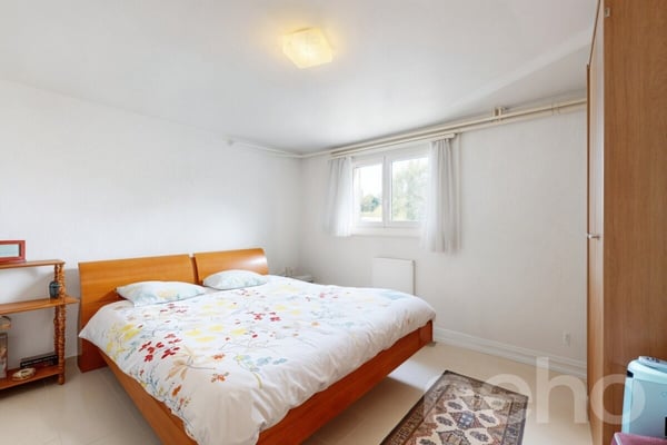 Maison villageoise de 2 appartements avec potentiel de transformation 11