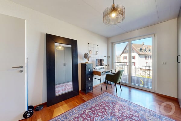 Stilvolle 3.5-Zimmerwohnung mit Balkon und Einstellhallenplatz 10