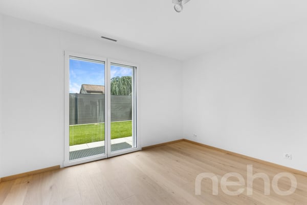 Maison jumelée neuve avec jardin, beaux volumes et finitions soignées 8