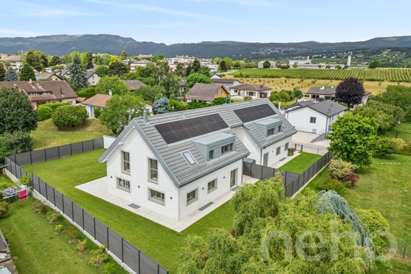 Maison jumelée neuve avec jardin, beaux volumes et finitions soignées 3