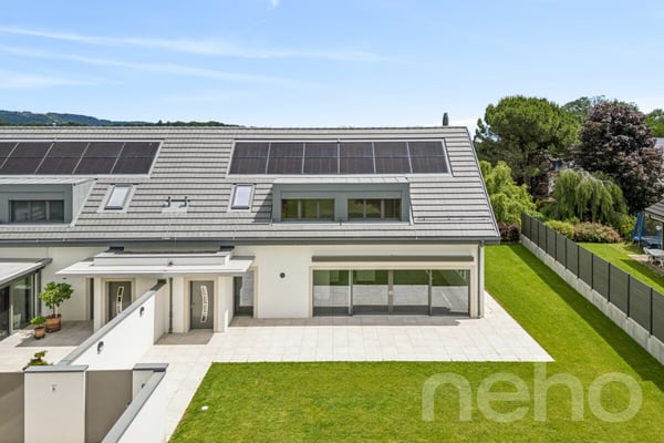 Maison jumelée neuve avec jardin, beaux volumes et finitions soignées 1