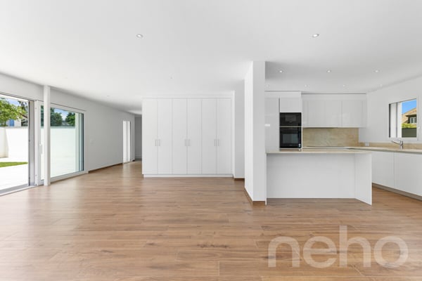 Maison jumelée neuve avec jardin, beaux volumes et finitions soignées 4