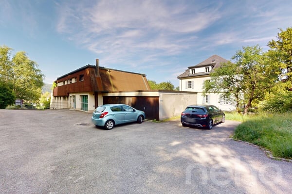 Superbe 4,5 pièces avec jardin, vue montagne et garage 1