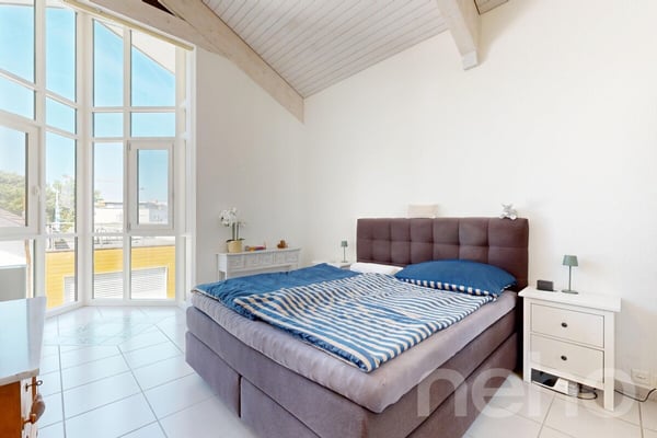 Lichtdurchflutete 4.5 Zimmer Dachwohnung mit Blick ins Grüne 7