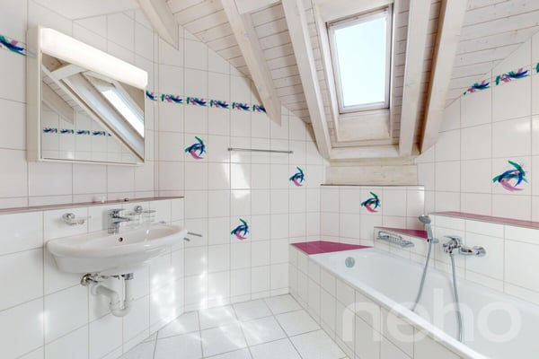 Stilvolle 4.5-Zimmer-Attika-Maisonette mit Charme und Komfort 9
