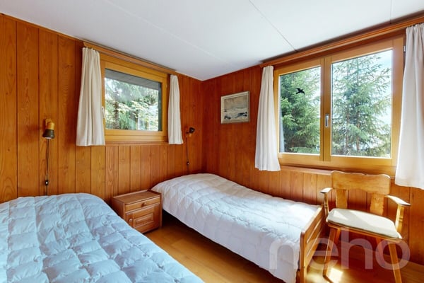 Alpines Chalet mit Einliegerwohnung und traumhafter Bergsicht 8