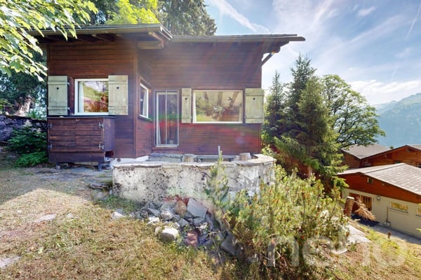 Alpines Chalet mit Einliegerwohnung und traumhafter Bergsicht 2