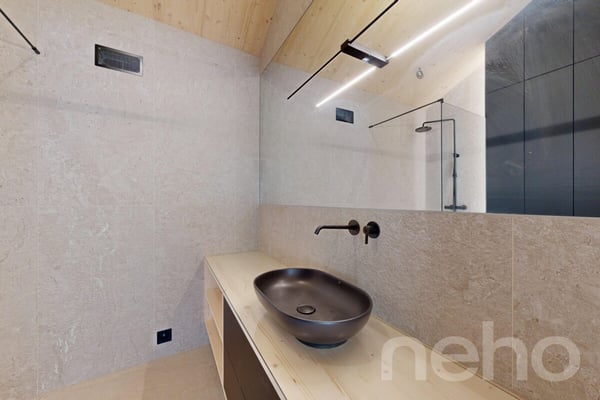 Neubau-Dachgeschosswohnung mit besonderer Architektur und Bergsicht 10