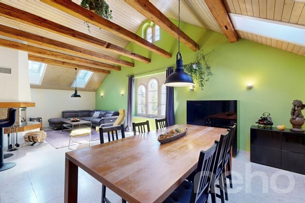 Einzigartige Dachgeschosswohnung mit Cheminée und Sichtbalken 12