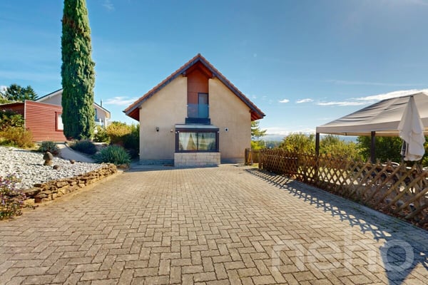 Maison individuelle avec grand jardin et vue dégagée proche d'Yverdon