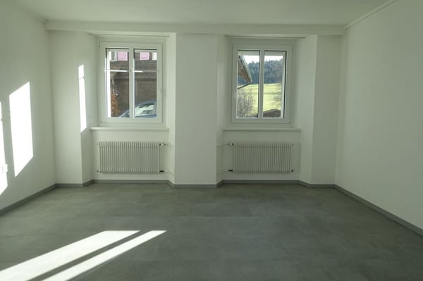 Tramelan - Locatif de 3 appartements + 3 garages 5