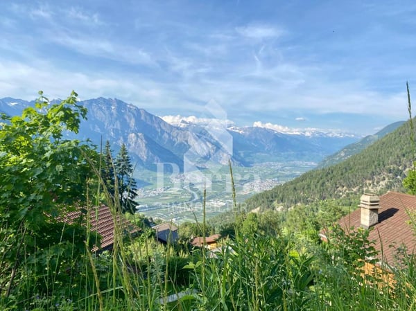 Terrain à bâtir avec vue sur la plaine du Rhône, résidence secondaire autorisée ! 1
