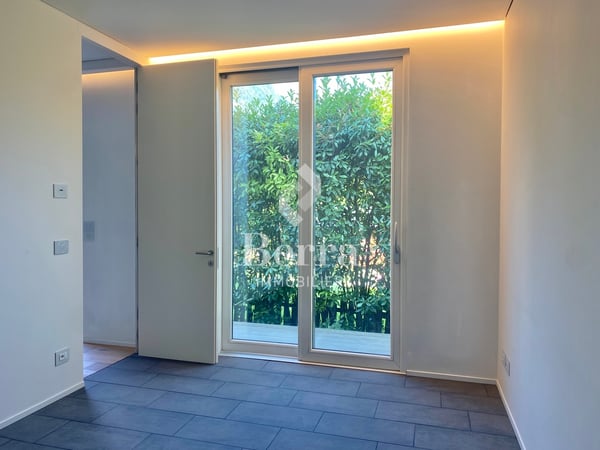 Appartement de 3.5 pièces de 75 m² - Rez-de-jardin avec terrasse 1