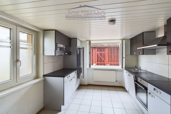 Grand immeuble de 3 appartements 5