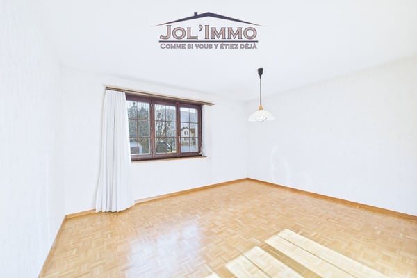 Maison familiale 6.5 pièces avec volumes généreux et grand jardin à Courrendlin 10