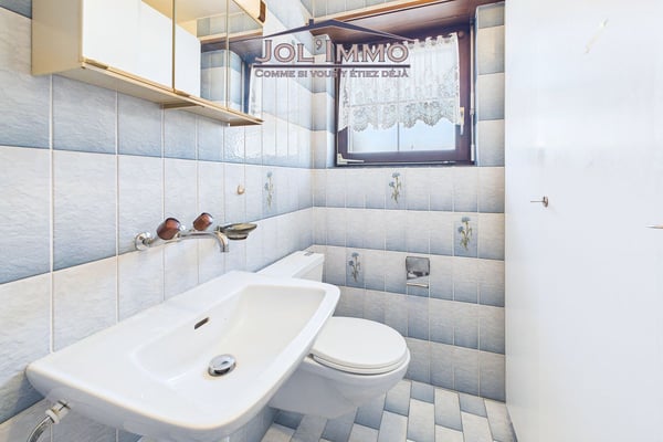 Maison familiale 6.5 pièces avec volumes généreux et grand jardin à Courrendlin 8