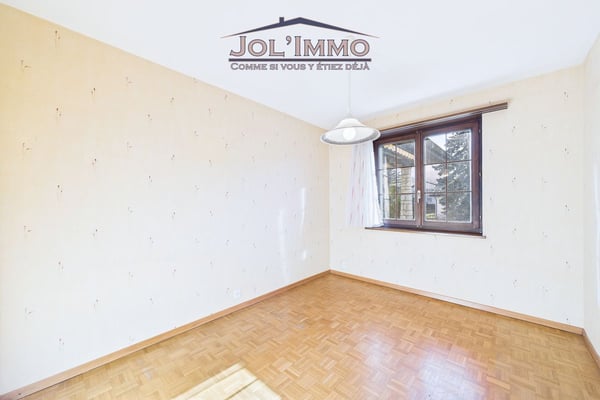 Maison familiale 6.5 pièces avec volumes généreux et grand jardin à Courrendlin 9