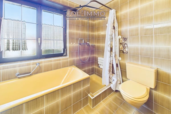 Maison familiale 6.5 pièces avec volumes généreux et grand jardin à Courrendlin 12