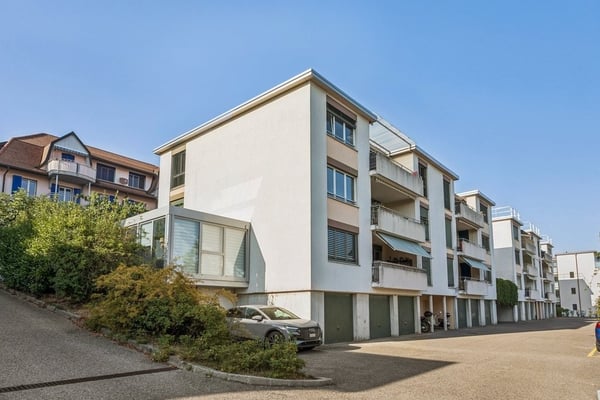 Appartement de 4.5 pièces avec balcon et vue sur le lac de Neuchâtel 1