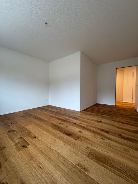 Moderne Wohnung mit Gartensitzplatz! 11