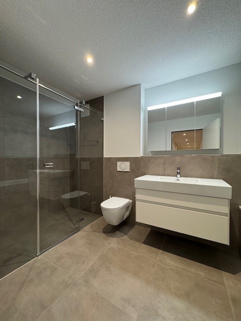 Moderne Wohnung mit Gartensitzplatz! 5