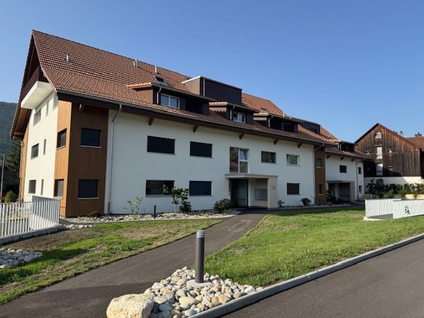 Moderne Wohnung mit Gartensitzplatz! 2