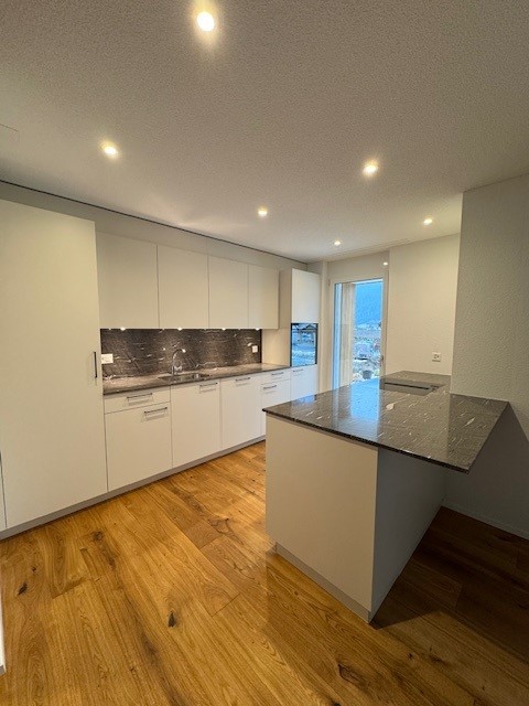 Moderne Wohnung mit Gartensitzplatz! 8