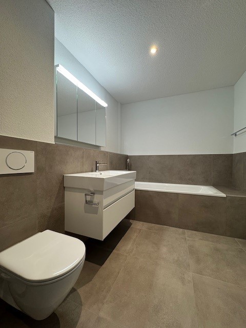 Moderne Wohnung mit Gartensitzplatz! 6