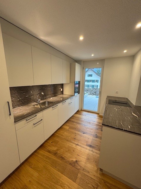 Moderne Wohnung mit Gartensitzplatz! 9