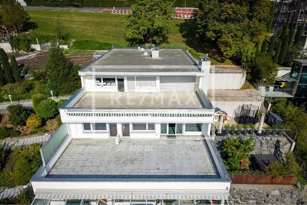 Exklusive 6.5-Zimmer-Terrassen-Wohnung mit herrlicher Aussicht und 5 Garagenplätzen! 13