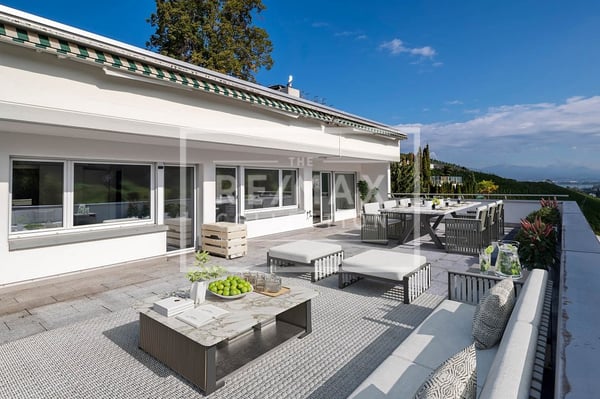 Exklusive 6.5-Zimmer-Terrassen-Wohnung mit herrlicher Aussicht und 5 Garagenplätzen!