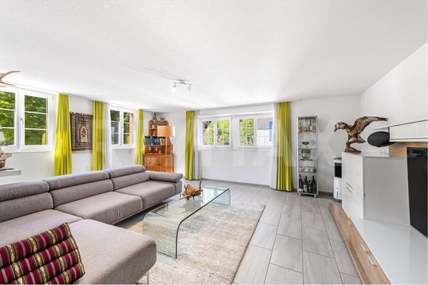 Mehrfamilienhaus mit drei Wohnungen und Baulandreserve 9