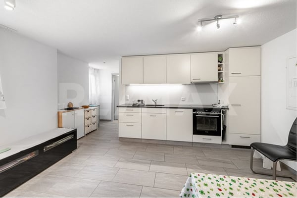 Mehrfamilienhaus mit drei Wohnungen und Baulandreserve 5