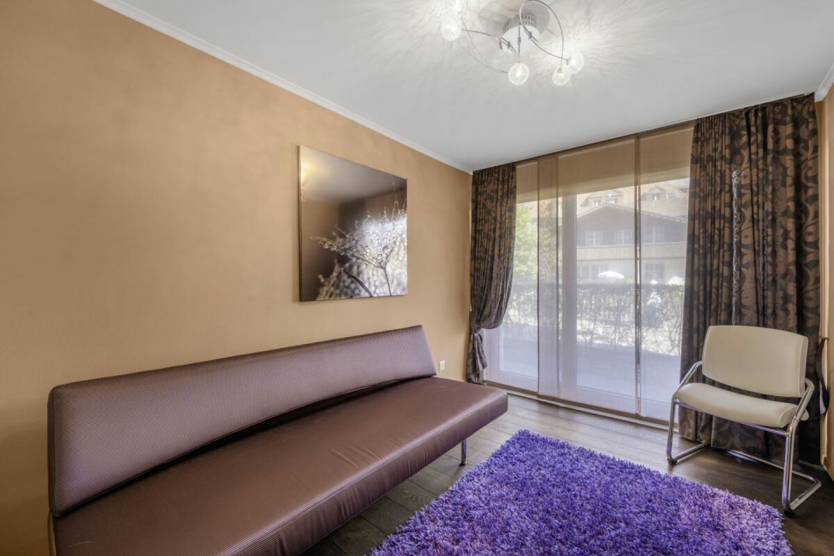 Vivere sul lago 4,5 locali appartamento con giardino a Iseltwald