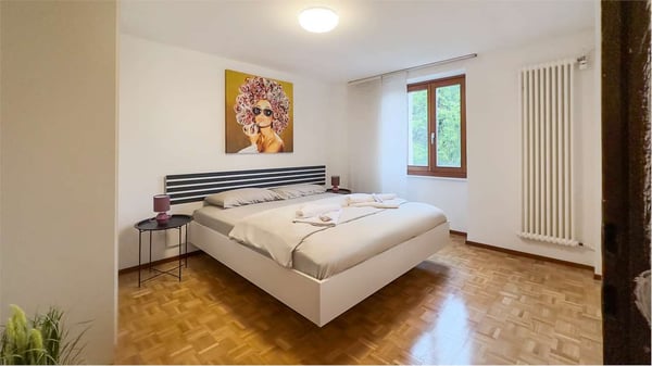 PALAZZINA A REDDITO A COMANO 1