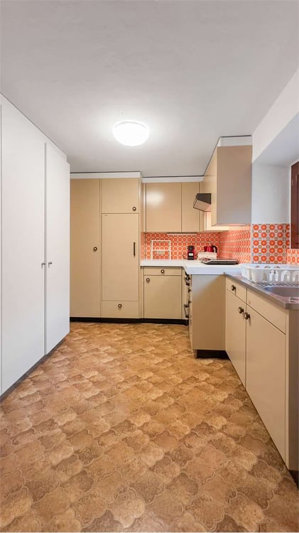 PALAZZINA A REDDITO A COMANO 9