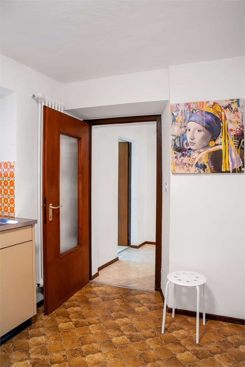 PALAZZINA A REDDITO A COMANO 3