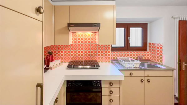 PALAZZINA A REDDITO A COMANO 10