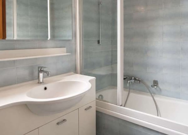 Comano - Elegante appartamento 2.5 locali con piscina e vista panorami 5
